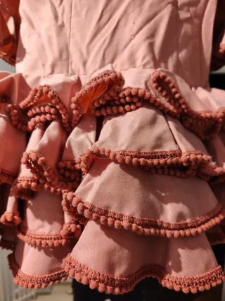 Traje de flamenca corto rosa volantes infantil