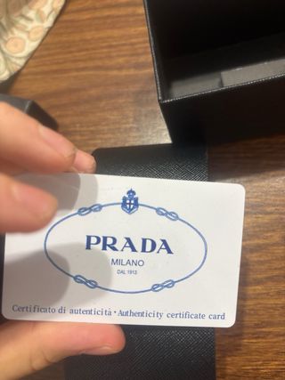 Occhiali Prada Neri e Gialli.