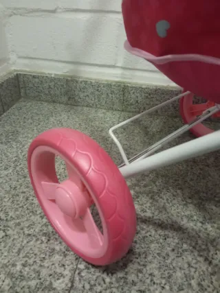 Carro de muñecas rosa con capota nuevo a estrenar