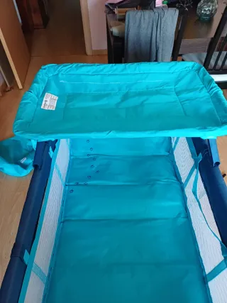 Cuna de viaje azul