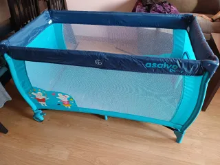 Cuna de viaje azul