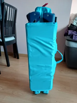Cuna de viaje azul