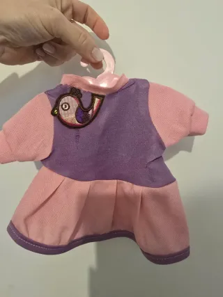 Muñeca bebé con accesorios de cambio de pañal