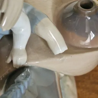 Figura Lladro campesina con burro y niño