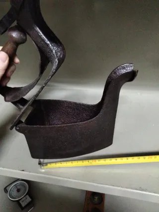 Plancha de carbón antigua