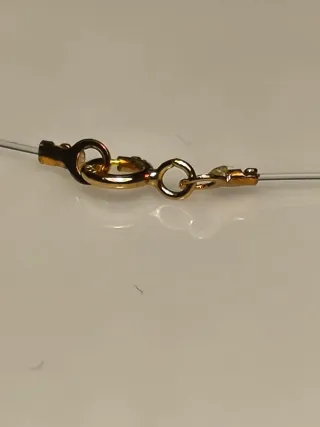 Collar hilo de pescar oro 18K con circonita