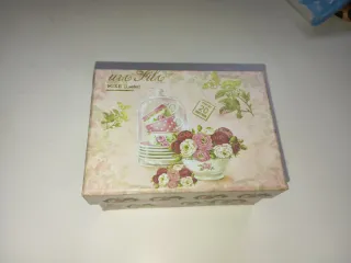 Vela artesanal de cerámica beige y azul