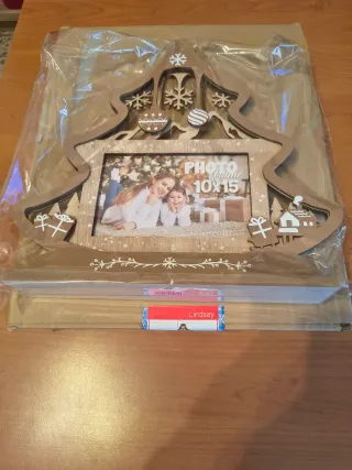 Portafoto legno decorato con montagne e fiocchi di