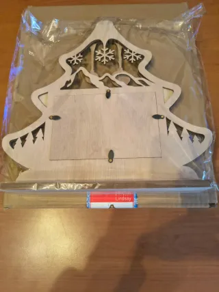 Portafoto legno decorato con montagne e fiocchi di