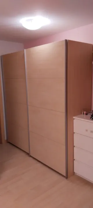 Armario puertas correderas madera y metal