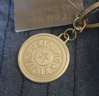 Pochette Kipling vintage grigio/oro