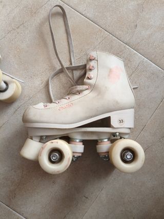 Patines blancos 4 ruedas para iniciación