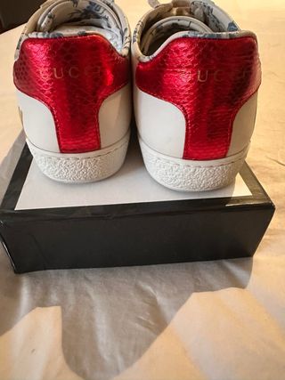 Sneakers Gucci bianche e dorate in pelle crema