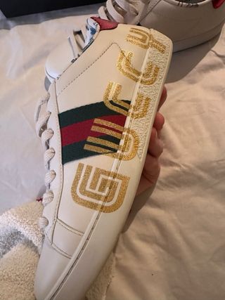 Sneakers Gucci bianche e dorate in pelle crema
