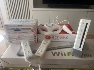 Pacchetto Nintendo Wii con giochi e accessori