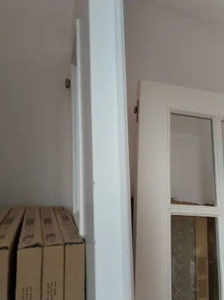 Puerta doble madera maciza con cristalera