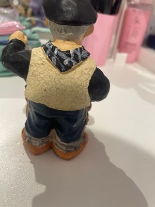 Figura de marinero con saco de regalos