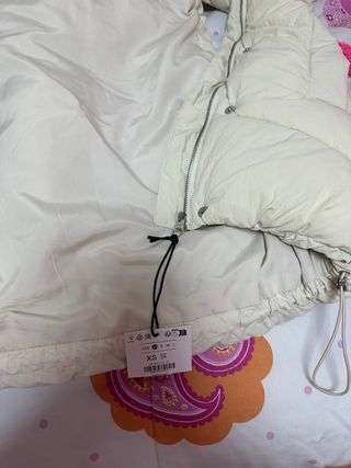 Chaleco acolchado Bershka beige mujer