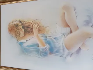 Cuadro mujer rubia en marco dorado