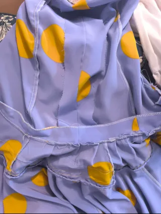 Traje de flamenca morado y amarillo