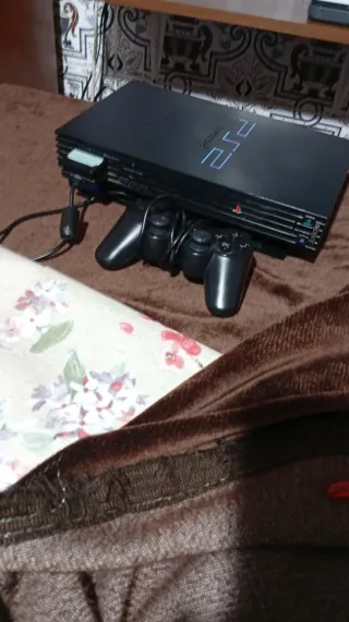 Consola PlayStation 2 con juegos
