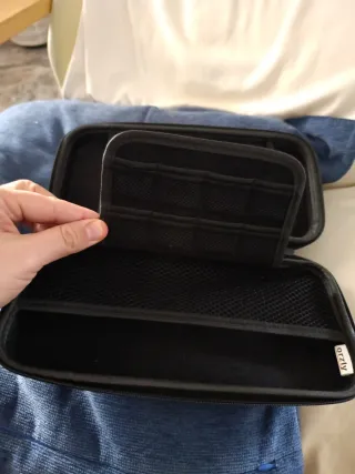 Funda Nintendo Switch con compartimento