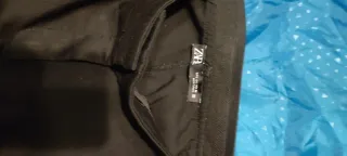 Elegante blusa blanca y pantalón de vestir