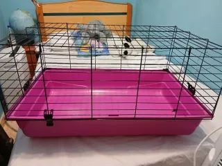 Jaula para mascotas rosa y negra