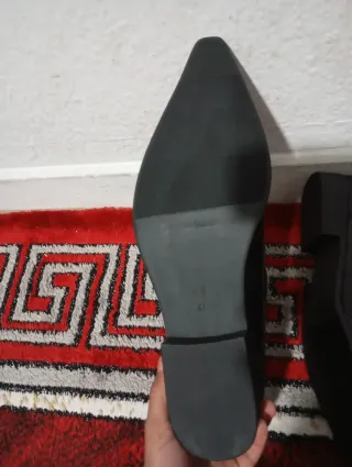 Botas media caña negras con hebillas