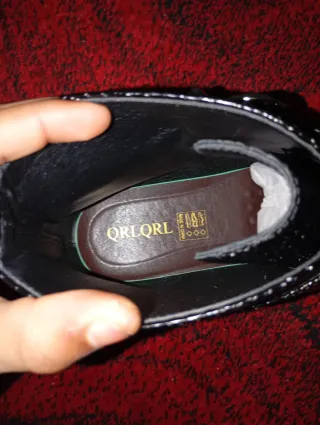 Botas media caña negras con hebillas