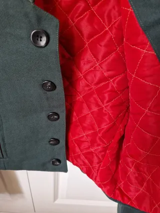 Chaquetilla flamenca verde con forro rojo