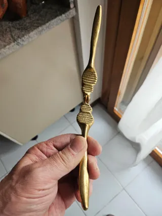 Schiaccianoci ottone lucido teste leone