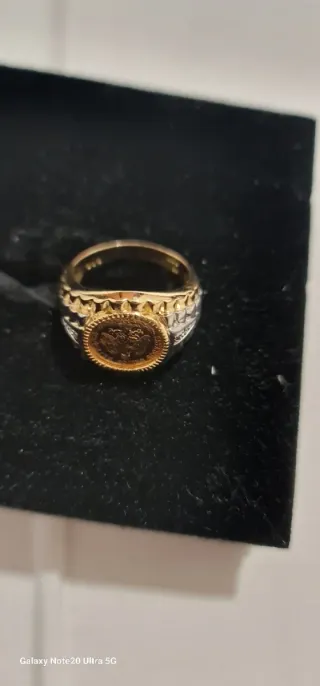 Anillo de oro amarillo y oro blanco de 18k