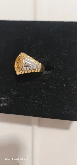 Anillo de oro amarillo y oro blanco de 18k