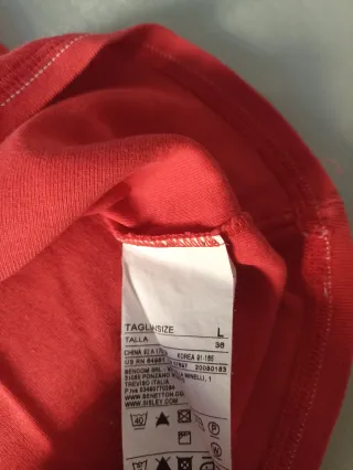 Maglietta Benetton arancione scollo a V