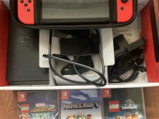 Nintendo Switch Rossa e Nera + 5 Giochi