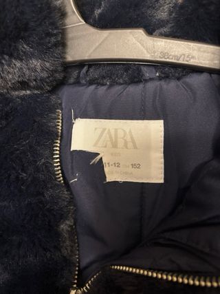 Chaqueta de pelo sintético con capucha Talla 11/12