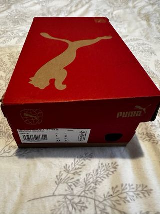 Zapatillas Puma multitacos niño talla 33.