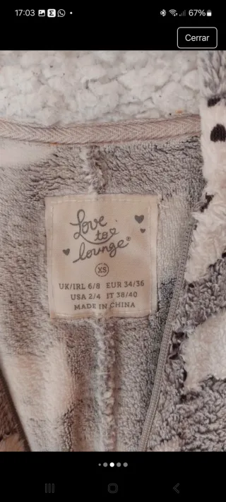 Mono pijama gris con estampado