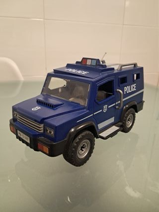Coche de policía de juguete azul