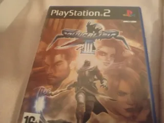 Consola PS2 gris con mandos y juegos + juegos