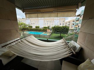 Hamaca doble de tela y madera