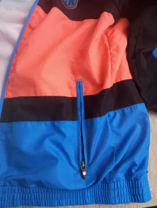 Sudadera Footkorner cremallera negra y naranja Tal
