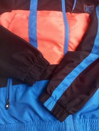 Sudadera Footkorner cremallera negra y naranja Tal