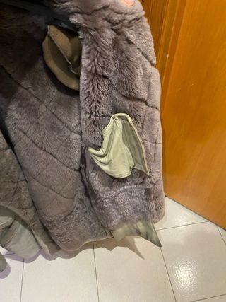 Cappotto in montone trapuntato con pelliccia