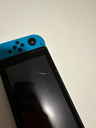 Nintendo Switch + Fundas de viaje y de accesorios