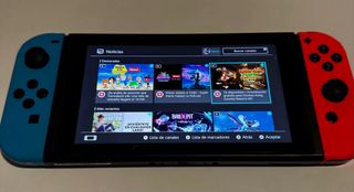 Nintendo Switch + Fundas de viaje y de accesorios