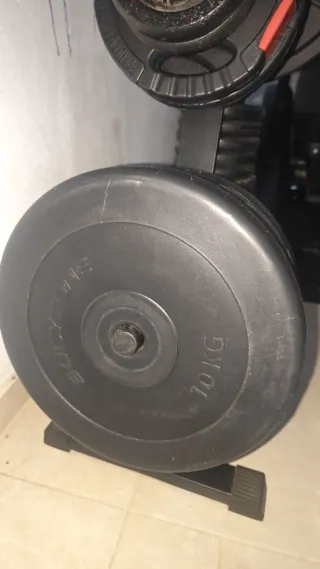 Discos de musculación plástico 10 kg (12 unidades)