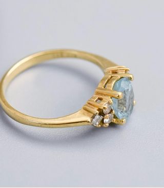 Anillo de oro con Topacio y Diamantes