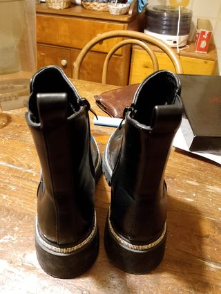 Stivali neri lucidi con inserti argento